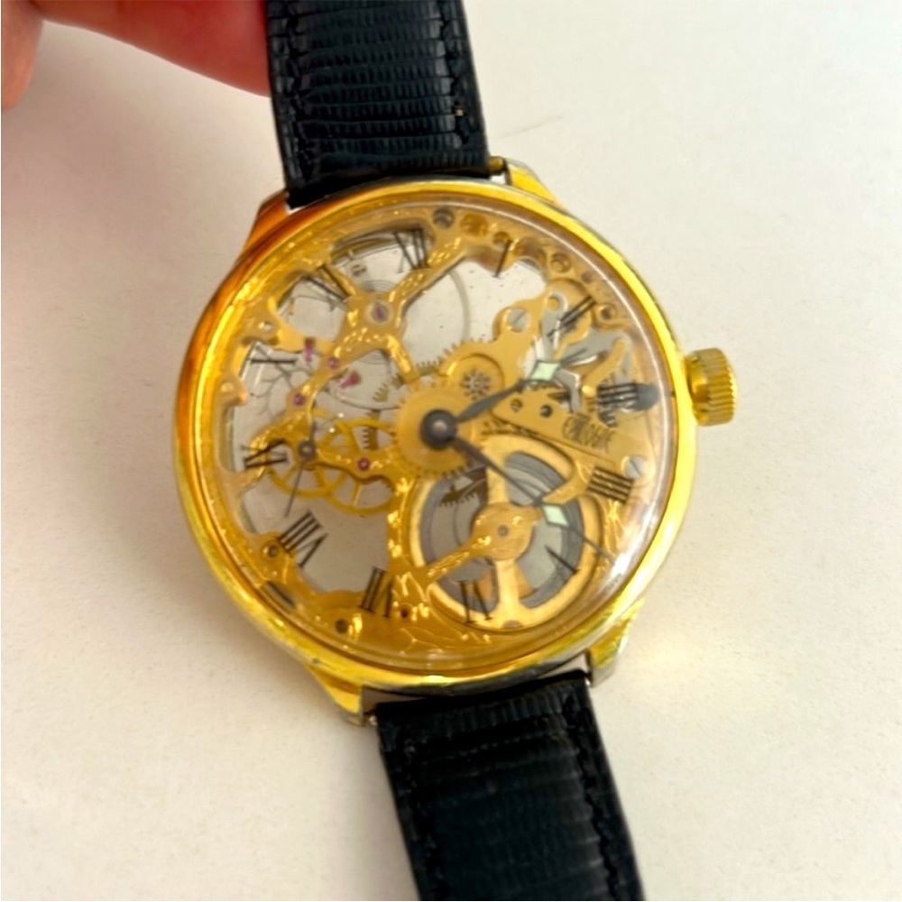 Gold plated Skeleton watch with Black leather Strap